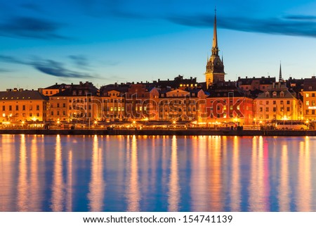 Scenic summer evening panorama of the Old Town (Gamla Stan) pier architecture in Stockholm, Sweden
