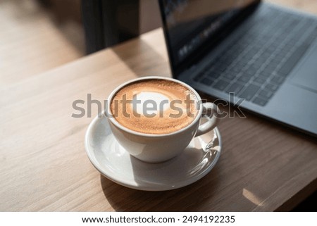 Similar – Foto Bild Nahaufnahme einer Tasse Kaffee mit Milch von oben gesehen