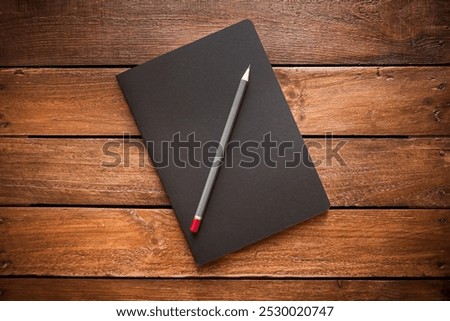 Similar – Image, Stock Photo closed notebook and wooden blue pencil