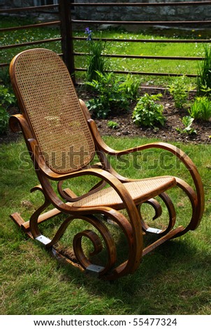 Classic rocking chair on grass