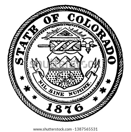 The Seal of Colorado, 1876. The seal shows The Eye of Providence, on top within triangle, below that rod with a battle axe bound together, with a ribbon, a shield has a pick and hammer, vintage