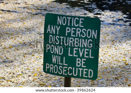 Do not disturb pond level warning sign.