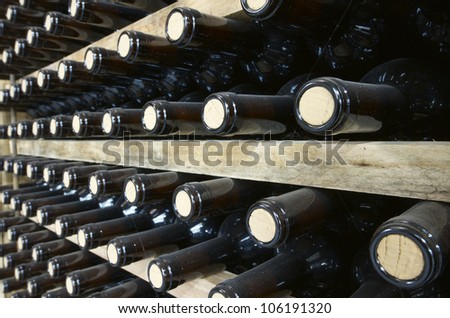 stacked wine bottles to ferment the wine, La Rioja, Spain