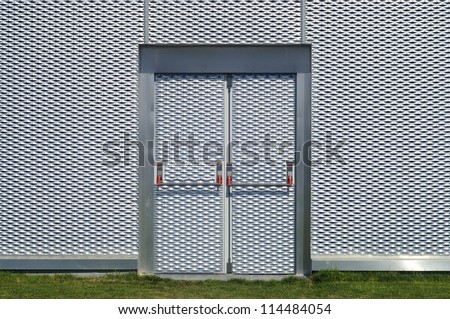 emergency door in the facade of a metal building