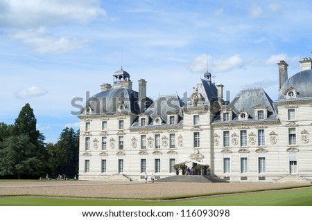CHEVERNY, FRANCE - AUGUST 16: Castle on August 16, 2012 in Cheverny: Tourists walk in the castle of Cheverny. Built in the 17th century, was inspired by the work of the best artists of the time.