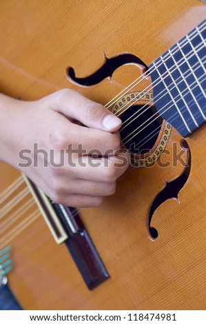 Closeup of a Spanish guitar during a concert