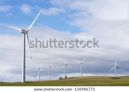 aligned windmills for renewable electric energy production