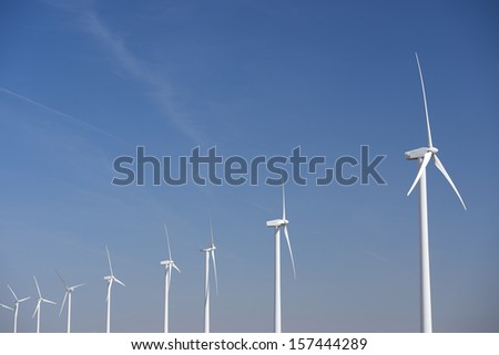 group of windmills for renewable electric energy production