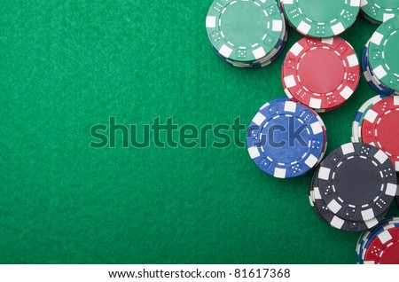background formed for casino chips on a green felt
