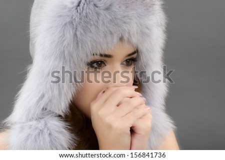 portrait of woman in fur cap