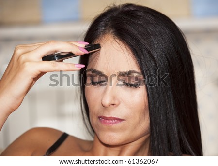 woman bringing your head and remember that she forgot something