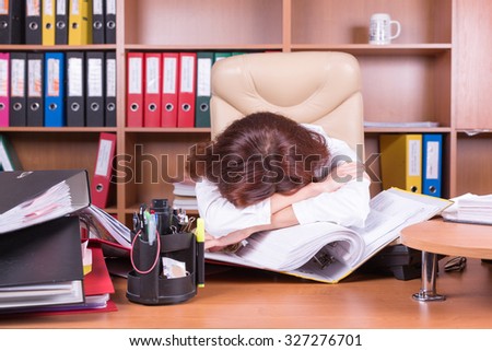 tired woman sleep on workplace