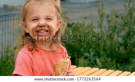 Similar – Image, Stock Photo Little girl with dirty and sad face. She is going to burst out crying that her favourite food is over