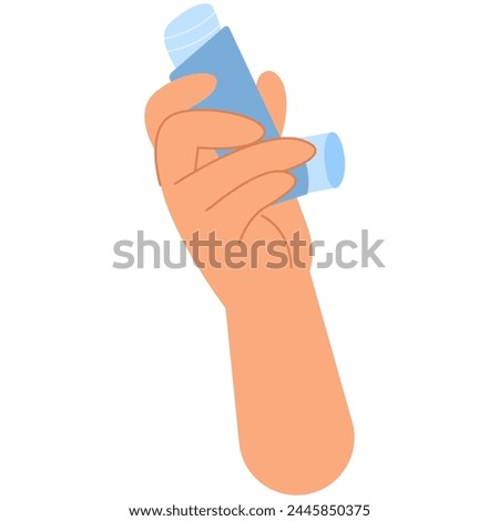A hand holds an asthma inhaler. World Asthma day. Allergy, asthmatic. Inhalation medicine.
