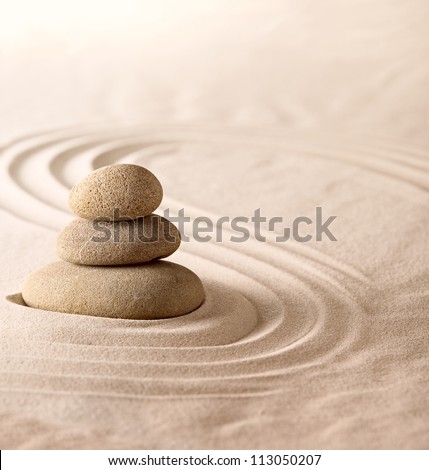 zen garden place for meditation and relaxation in Japanese culture, simplicity and harmony for concentration. Sand and stone form nice lines and pattern