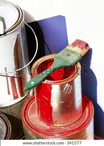 red paint can and brush