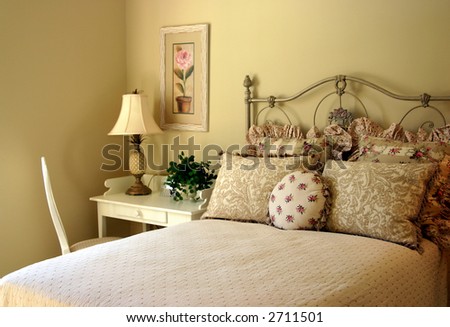 romantic guest bedroom with desk and chair