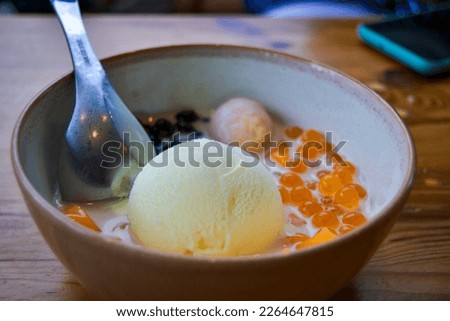 Similar – Image, Stock Photo Hot porridge with frozen blueberries