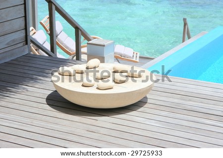 game board on private deck of luxurious villa