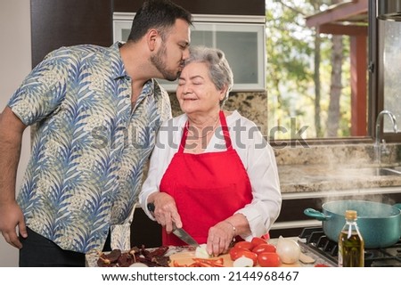 Similar – Image, Stock Photo Senior woman and her adult daughter playing cards at home