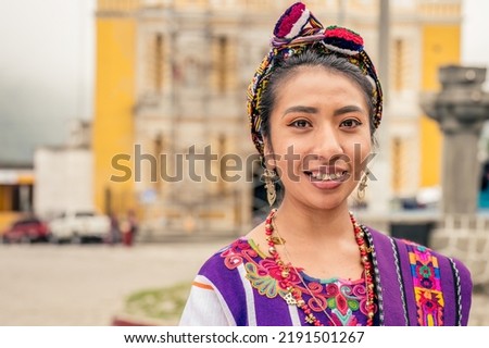 Portrait of an indigenous woman looking at the camera smiling and happy. Hispanic woman. Foto stock © 