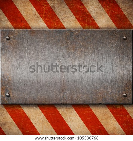 Grunge metal plate with white and red stripes