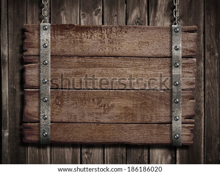Medieval wood sign board over old wooden plaque