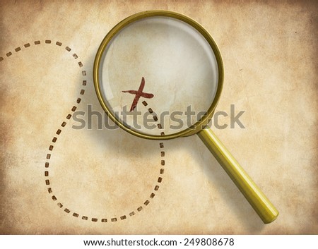 Magnifying glass and track with marked location on old map. Path finding concept