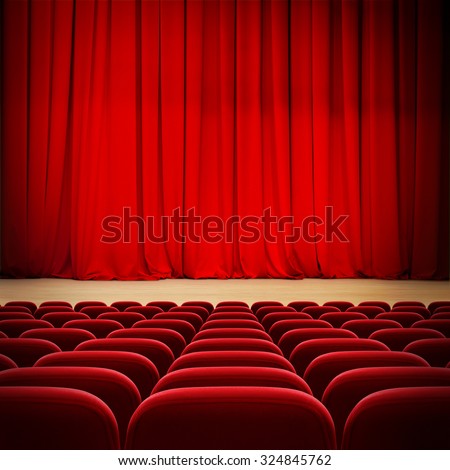 theatre red curtain on stage with red velvet seats