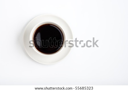 Top view of black coffee cup on white