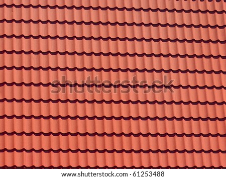 Red tiles of modern rooftop