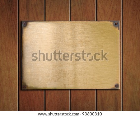 Vintage metal plate  on old oak door