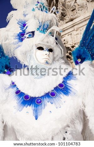VENICE, ITALY - FEBRUARY 16: Unidentified person in Venetian masks at St. Mark\'s Square, Carnival of Venice on February 16, 2012. The annual carnival is from February 11 to February 21, 2012.