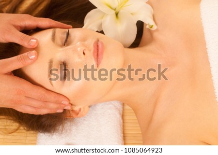 Face Massage. Close-up of a Young Woman Getting Spa Treatment 商業照片 © 