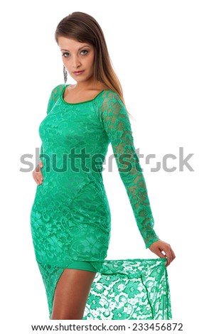 beautiful girl in green evening gown posing against white background isolated