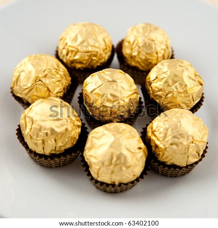 Chocolates Wrapped In Golden Paper Stock Photo 63402100 : Shutterstock