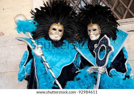 VENICE, ITALY - MARCH 7: Unidentified people in Venetian mask at St. Mark's Square, Carnival of Venice on March 7, 2011 in Venice, Italy. The annual carnival is from February 26 to March 8, 2011.
