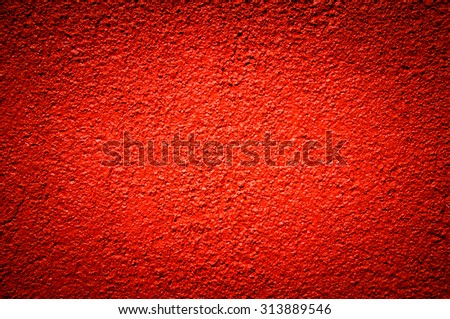 dark red cement plaster wall background and texture
