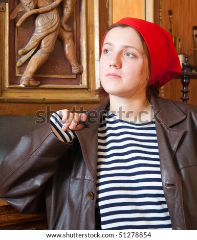 Vintage portrait of girl in red kerchief and sailor's striped vest