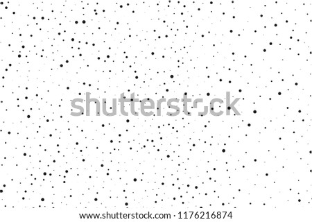 Elegant pattern with black polka dots of small and large scale. Splatter background. Black glitter blow explosion and splats on white. Grunge texture. Vector illustration  