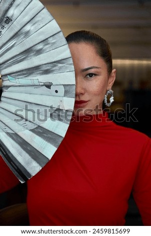 Similar – Image, Stock Photo Elegant woman with fan performing Flamenco dance