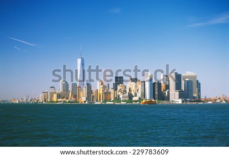 Panoramic view of the Manhattan Island on a sunny day from the Staten Island Ferry.