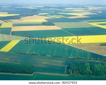 Aerial view of fields with wind turbines. France.
