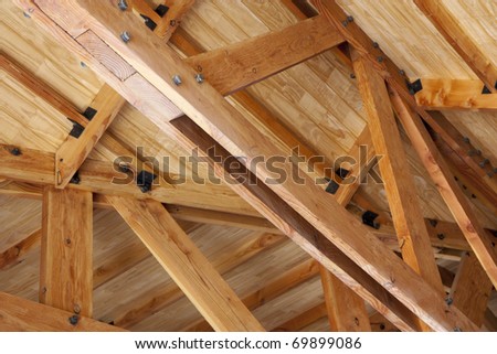 Wooden construction - roof truss made of beams
