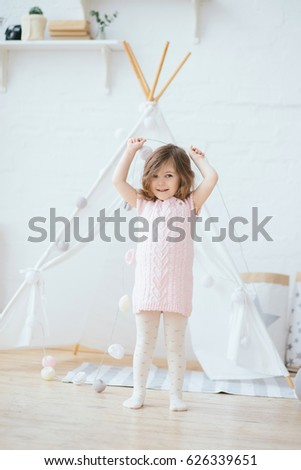 Similar – Image, Stock Photo 3-year-old birthday girl playing with her balloons on the couch