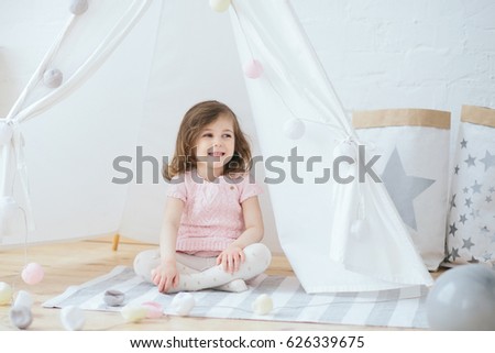 Similar – Image, Stock Photo 3-year-old birthday girl playing with her balloons on the couch