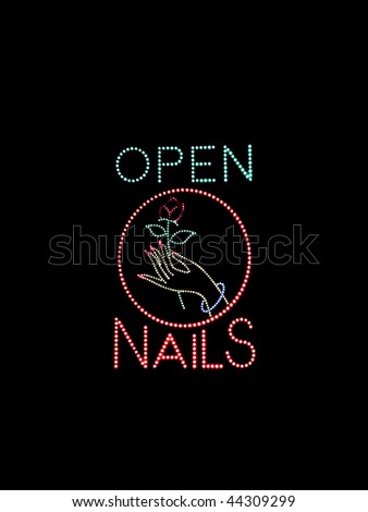 Open sign found in the windows of nail salons