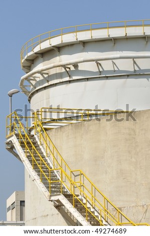a stairway up to a cement tower
