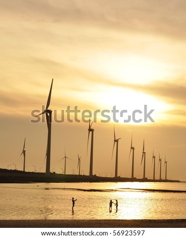gold sunset at the wind-power station