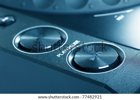 Play and stop buttons on Dj cd player, closeup